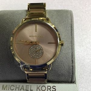Minhaek Kors watch #  3706. Stainless steel 2 tone